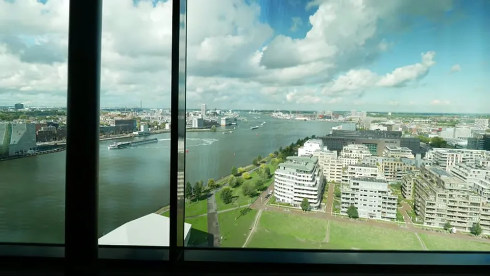 Centered POV from the red swing over Amsterdam at A'DAM Lookout